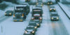 cars on a snowy highway