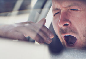drowsy driver yawning